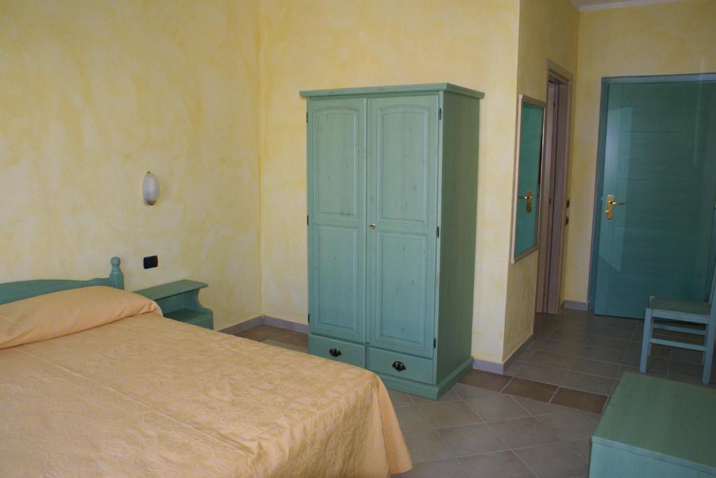 Albergo Residenziale Gli Ontani Cala Liberotto Kamer foto